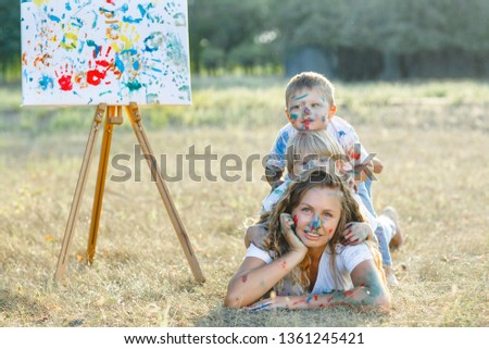 Mother having fun with kids outdoor