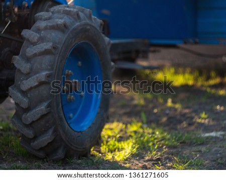 Tractor wheel on the grass
