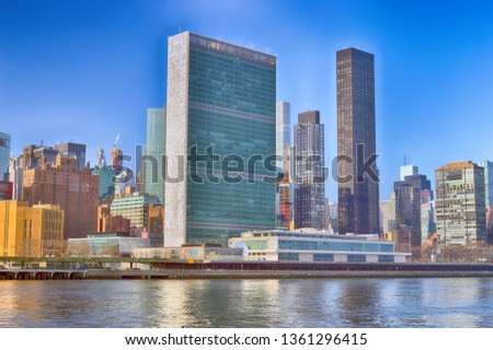 View of Midtown Manhattan skyline with United Nations Building.