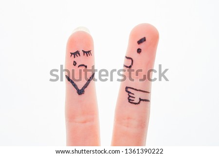faces painted on the fingers, the scene of a quarrel
