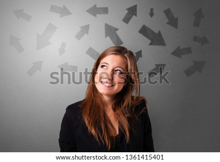 Business person choosing between several directions