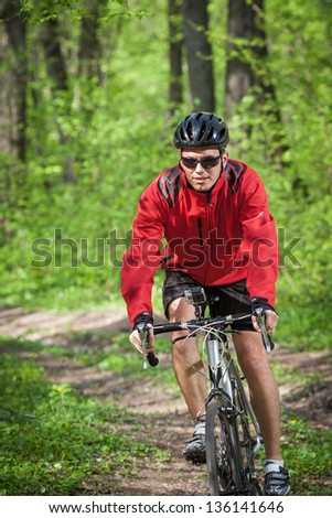 mountain bike race in a forest
