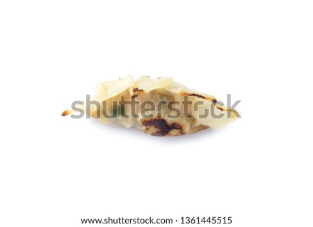 Picture of fried dumplings or gyoza isolated on white background