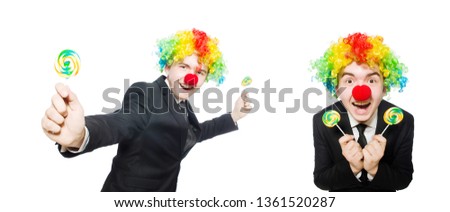 Clown with lollipop isolated on white