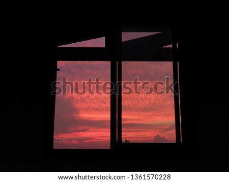 pink window frame light sunset or sunrise colors.