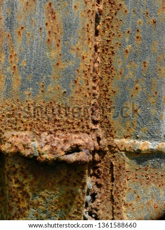 rusty dark blue iron wall