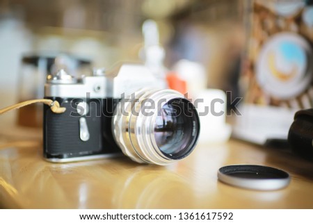 blurred background with vintage camera / photo old camera, unusual vintage, hipster camera