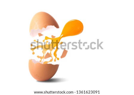 Egg yolk comes out of the shell