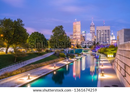 beautiful indiannapolis skyline with reflection on water.