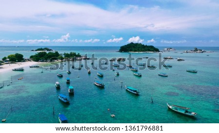 beautiful scenery in the morning with a collection of ships and blue sea Royalty-Free Stock Photo #1361796881