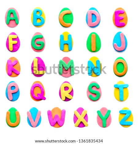 Plasticine colorful alphabet in the form of a set of Easter eggs on a white background