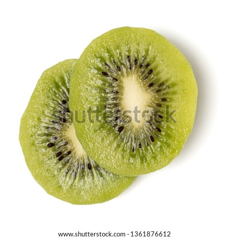 Two peeled kiwi fruit slices isolated on white background closeup. Kiwifruit slices without peel,  flatlay. Flat lay, top view.