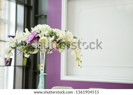 wedding decorations from flowers in purple tone. Banquet room decorated for the holiday