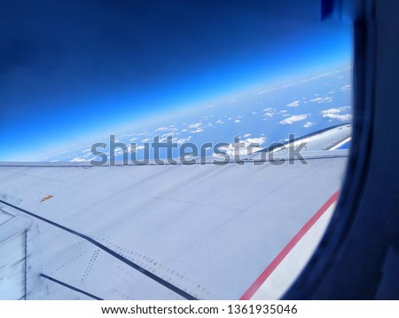 Blue planet Earth view from space in high resolution. Near space photography of Earth atmosphere from the airplane window. Earth most downloaded image.
