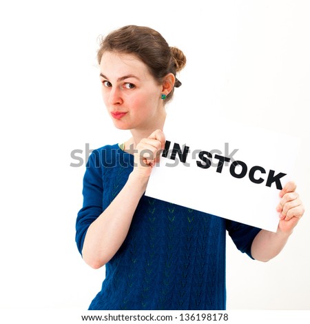 Dramatic young woman with board in stock