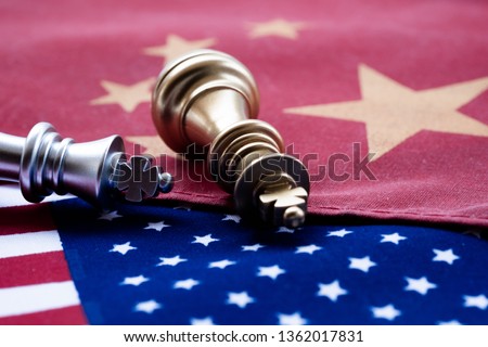 Chess game, two kings face to face on China and US national flags. Trade war concept. Conflict between two big countries, USA and China concept. Copy space. Royalty-Free Stock Photo #1362017831