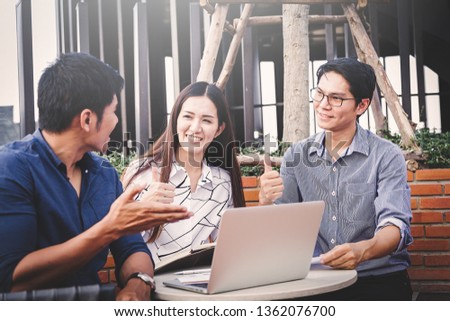 Discussing plan and idea to improvement strategy, businessmen brainstorming for strategy of business investment,businessmen review chart and document of investment information

