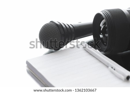 The microphone is on the table. Journalism simple concept.