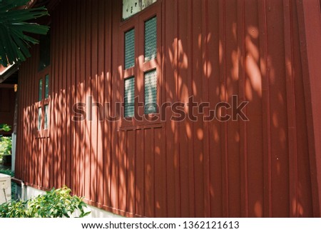 Red house and shadow