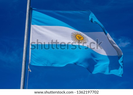 Flag of Argentina isolated against clear blue sky 
