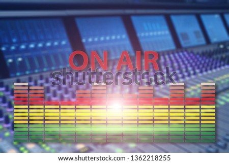 Broadcast studio on air. Media sound, radio and television record on professional audio panel blurred background.