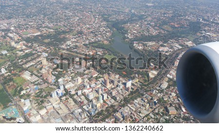 Aerial photo from the plane, with downtown buildings of the city of Foz de Iguazu in Brazil.