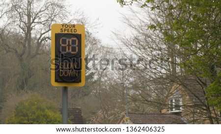 speed indicator display activated by vehicles passing and flashing your speed slow down