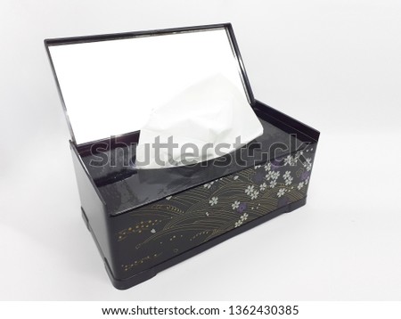 Black Floral Pattern Tissue Box Cosmetics in White Isolated Background