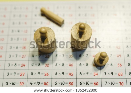 Wooden weights montessori to use in schools and teach children measures and weights.
