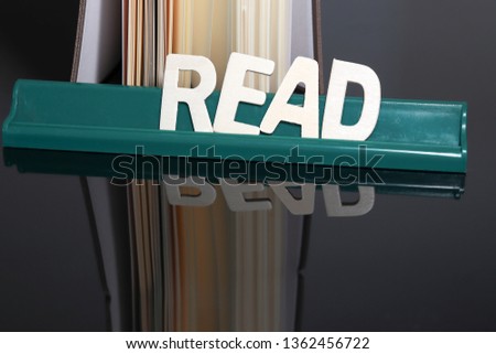 education books background concept with reflection