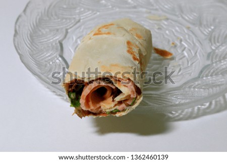 Mexico food if burrito over white background. Food photography.