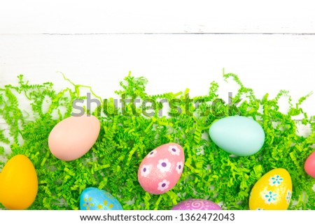 Easter Themed Background on a White Wooden Table