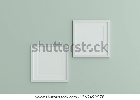 Two blank white picture frame template for place image or text inside on the wall.