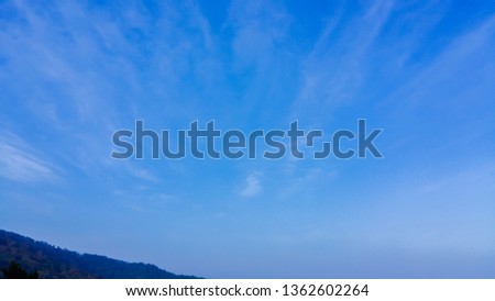 Soft and blurred light,The bright blue sky in the summer sky and the faint white clouds make the sky look stunning today.
Images of white clouds on a beautiful and bright blue background