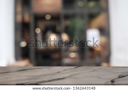 Empty rock table in front of abstract blurred background of forest . can be used for display or montage your products. Mock up for display of product