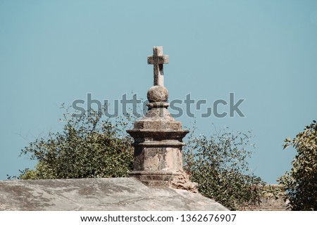Cross of Jesus on the top of ancient church located in Diu Fort at Diu, India