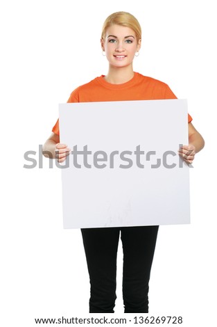 Portrait of a casual young woman holding blank card - over white background.