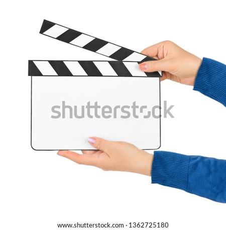 Blank clapboard in hands isolated on white background