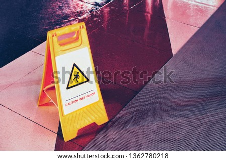 Wet floor warning sigh