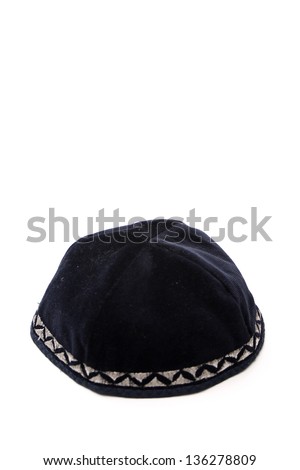 A kippah is a small cap (head covering), is a thin, slightly-rounded skullcap traditionally worn by observant Jewish men. Royalty-Free Stock Photo #136278809