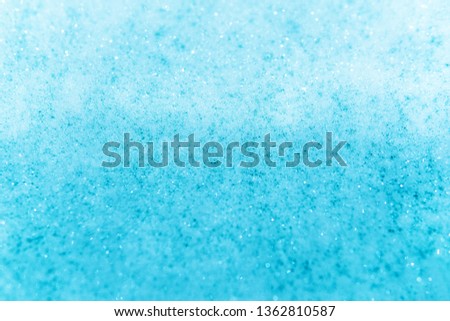 Light blue bath foam bubbles texture background.