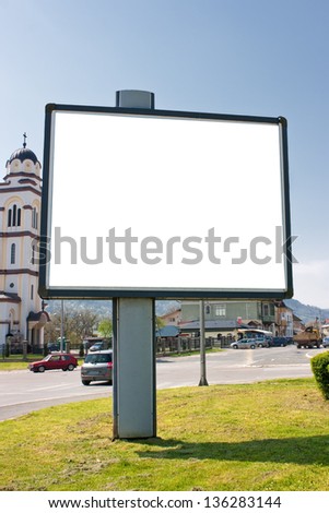 Blank billboard in the street in spring