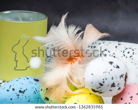 Cute photo with easter eggs, candle, decorated with rabbit, greeting card
