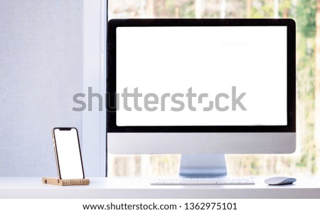 Mock up of a phone and a computer in a minimalism modern room, flat