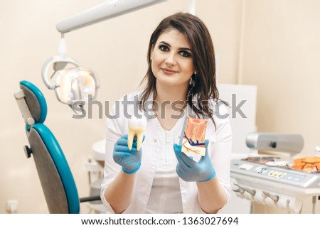 Taking oral care. Dentist and male patient in the dental room.