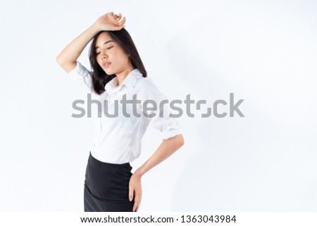 Portrait of young Asian Thai woman in an on white background.