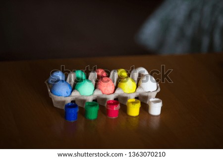 Colorful handmade easter eggs on dark background. holiday concept