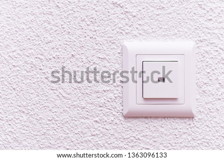 light switch on white wall