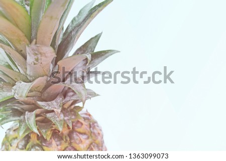 Pineapple isolated on light blue background, copyspace