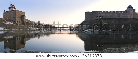 Hermann castle of Narva and Ivangorod Fortress winter landscape panorama, Estonia and Russia border
